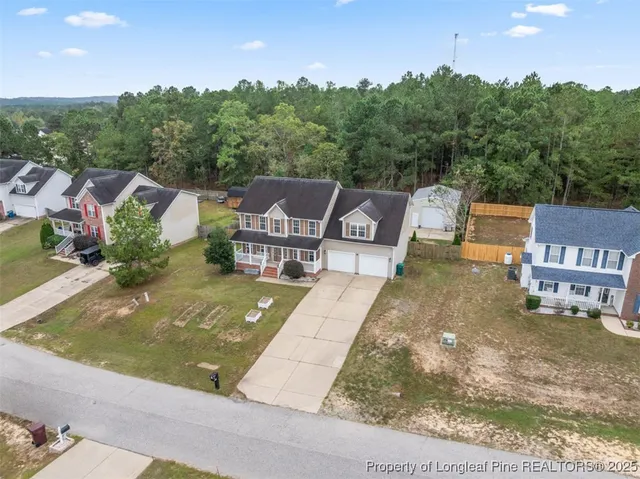 a view of a garage with parked cars
