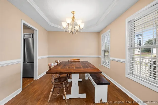 a view of a swimming pool with seating space