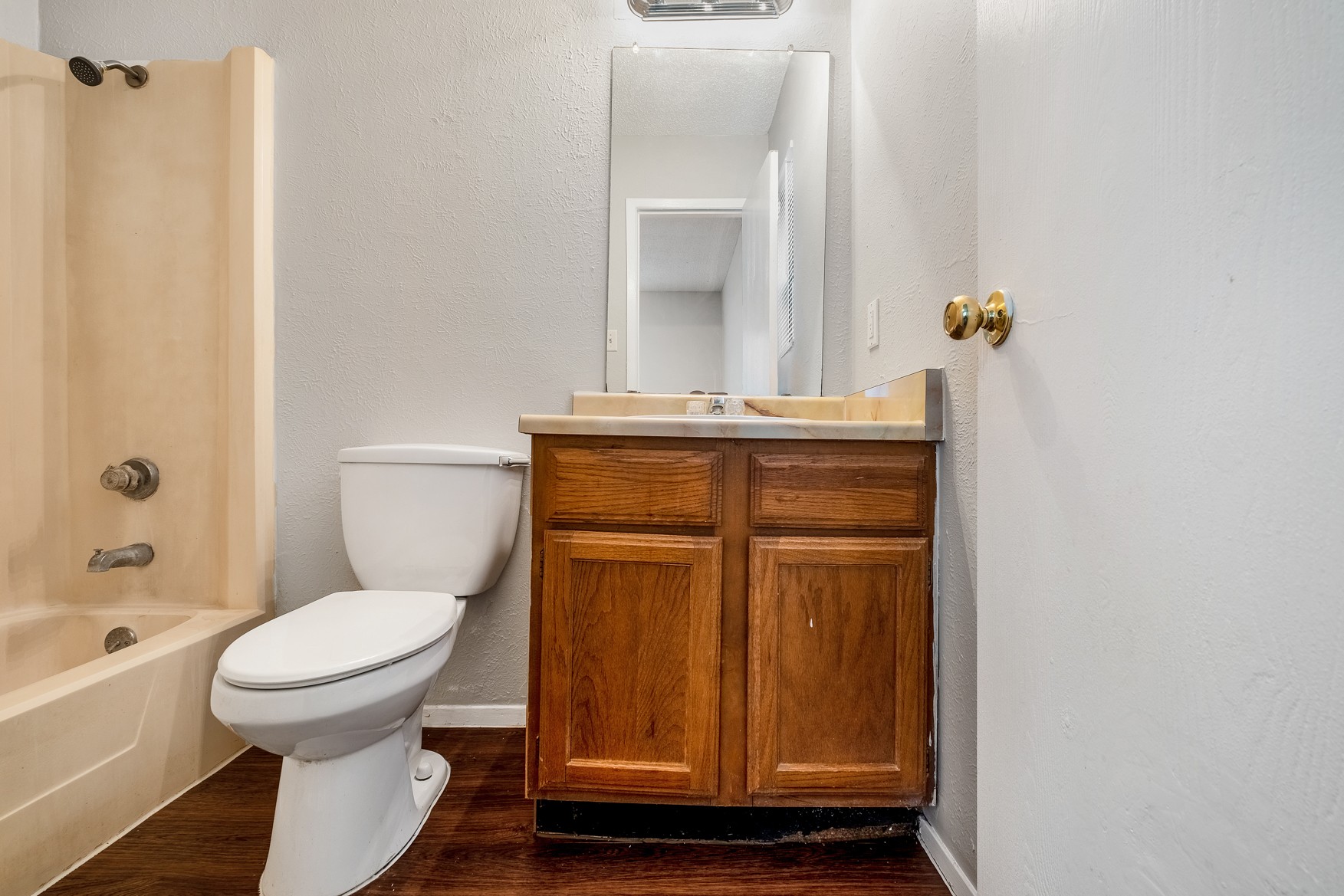 604 Misty Morning Way, Unit B Round Rock, TX 78664 - Photo 15 of 23 a bathroom with a toilet a sink and bathtub