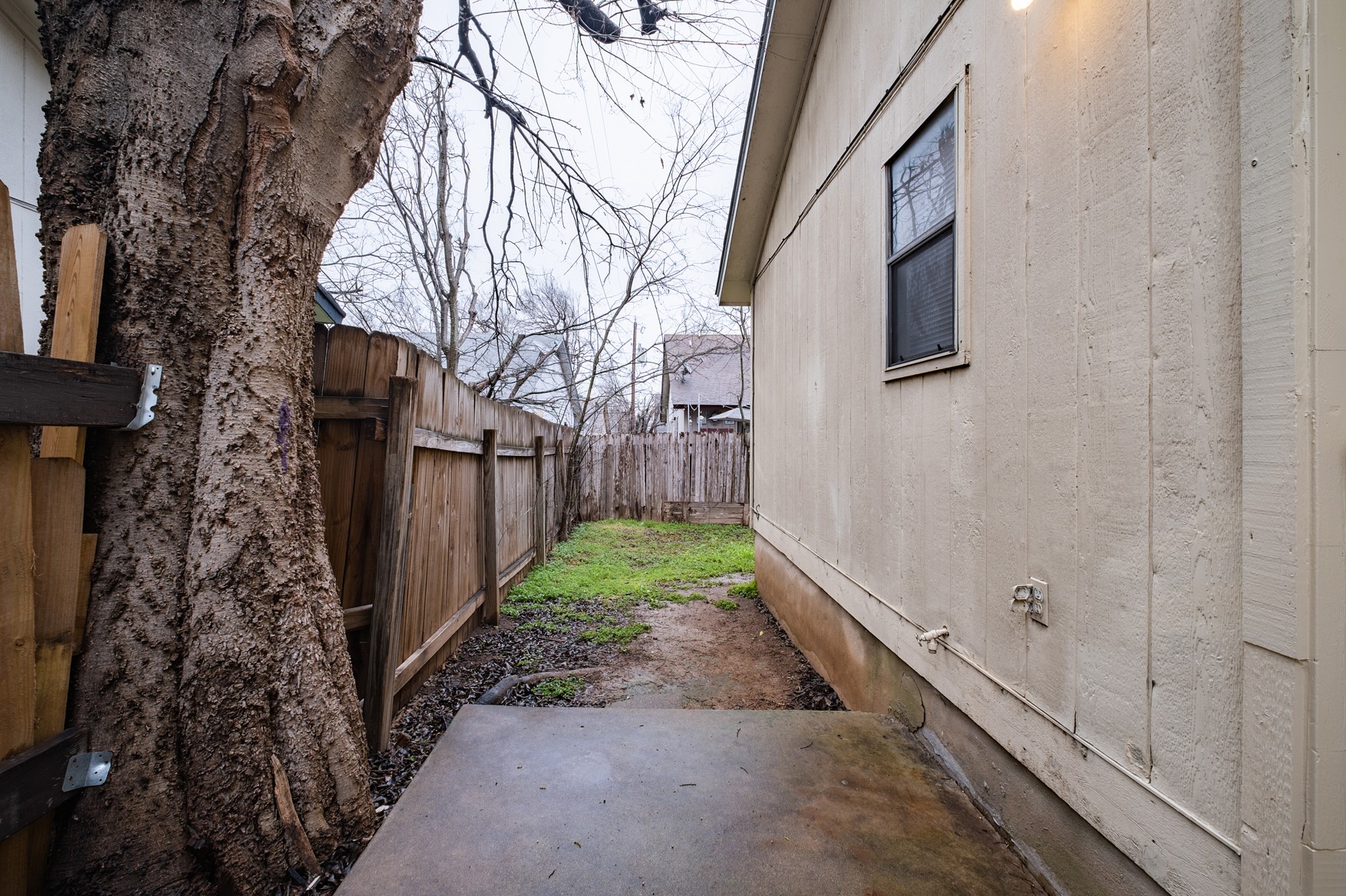604 Misty Morning Way, Unit B Round Rock, TX 78664 - Photo 16 of 23 a backyard of a house with lots of green space