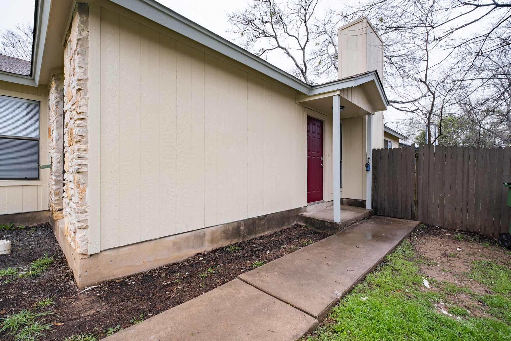 604 Misty Morning Way, Unit B Round Rock, TX 78664 - Photo 20 of 23 a backyard of a house with an outdoor space