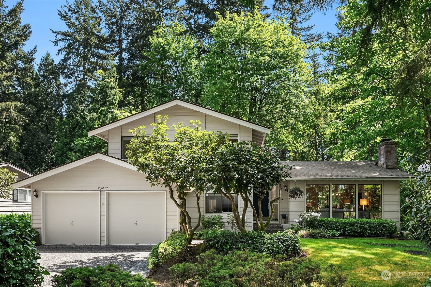 23017 38th Avenue Southeast Bothell, WA 98021 - Photo 1 of 38 front view of house with a yard