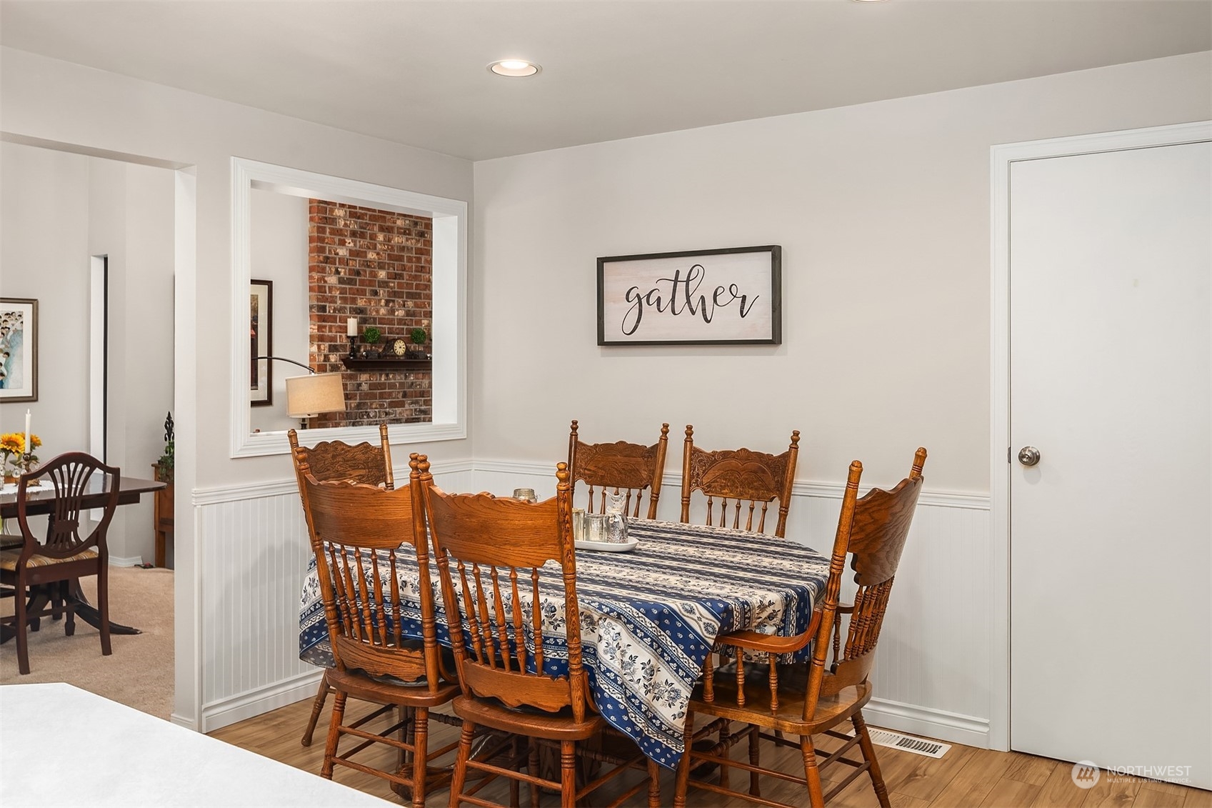 23017 38th Avenue Southeast Bothell, WA 98021 - Photo 12 of 38 a view of a dining room with furniture and wooden floor