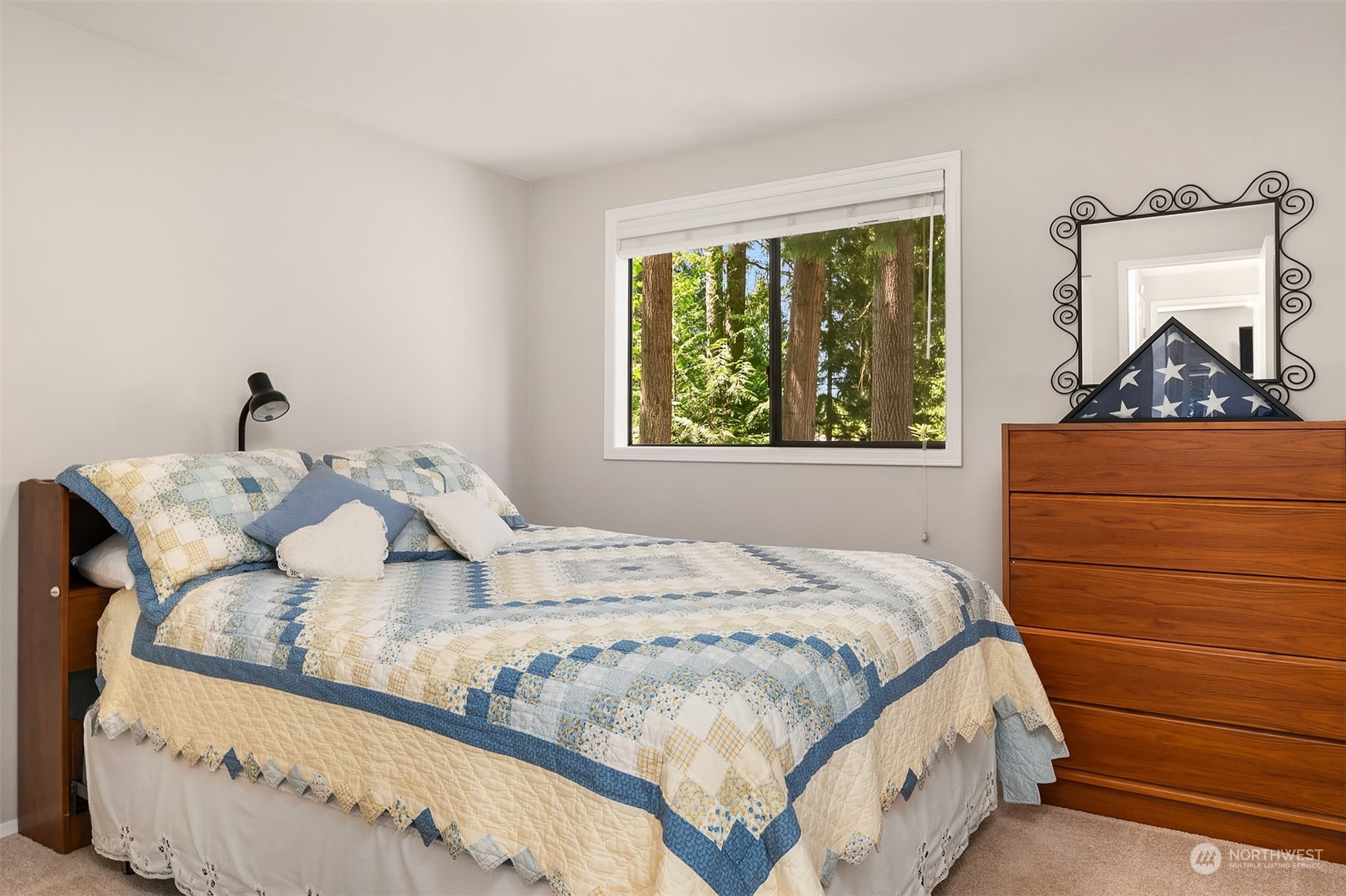 23017 38th Avenue Southeast Bothell, WA 98021 - Photo 16 of 38 a bedroom with a bed and window