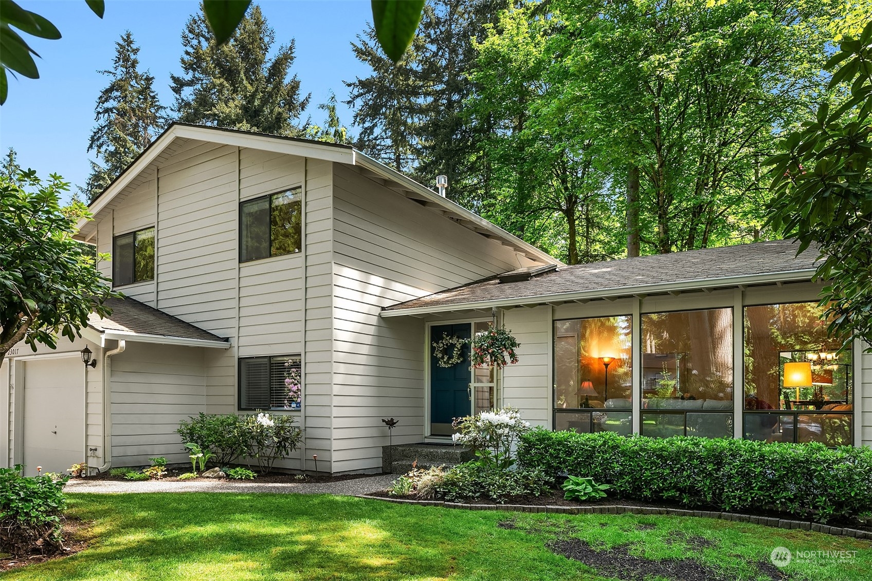 23017 38th Avenue Southeast Bothell, WA 98021 - Photo 2 of 38 a front view of house with yard and green space