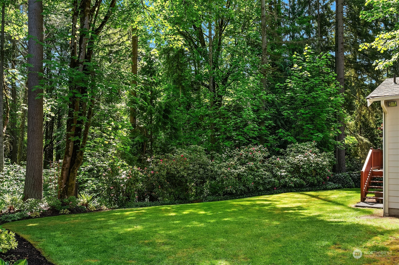 23017 38th Avenue Southeast Bothell, WA 98021 - Photo 30 of 38 a view of a backyard with swimming pool