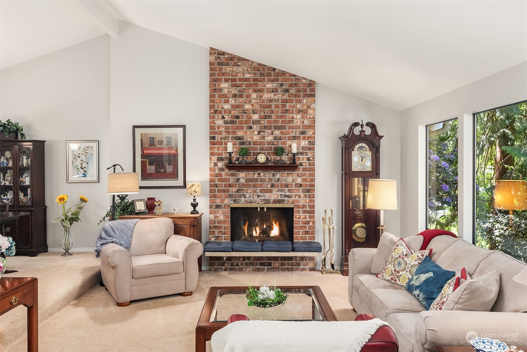 23017 38th Avenue Southeast Bothell, WA 98021 - Photo 3 of 38 a living room with furniture and a fireplace