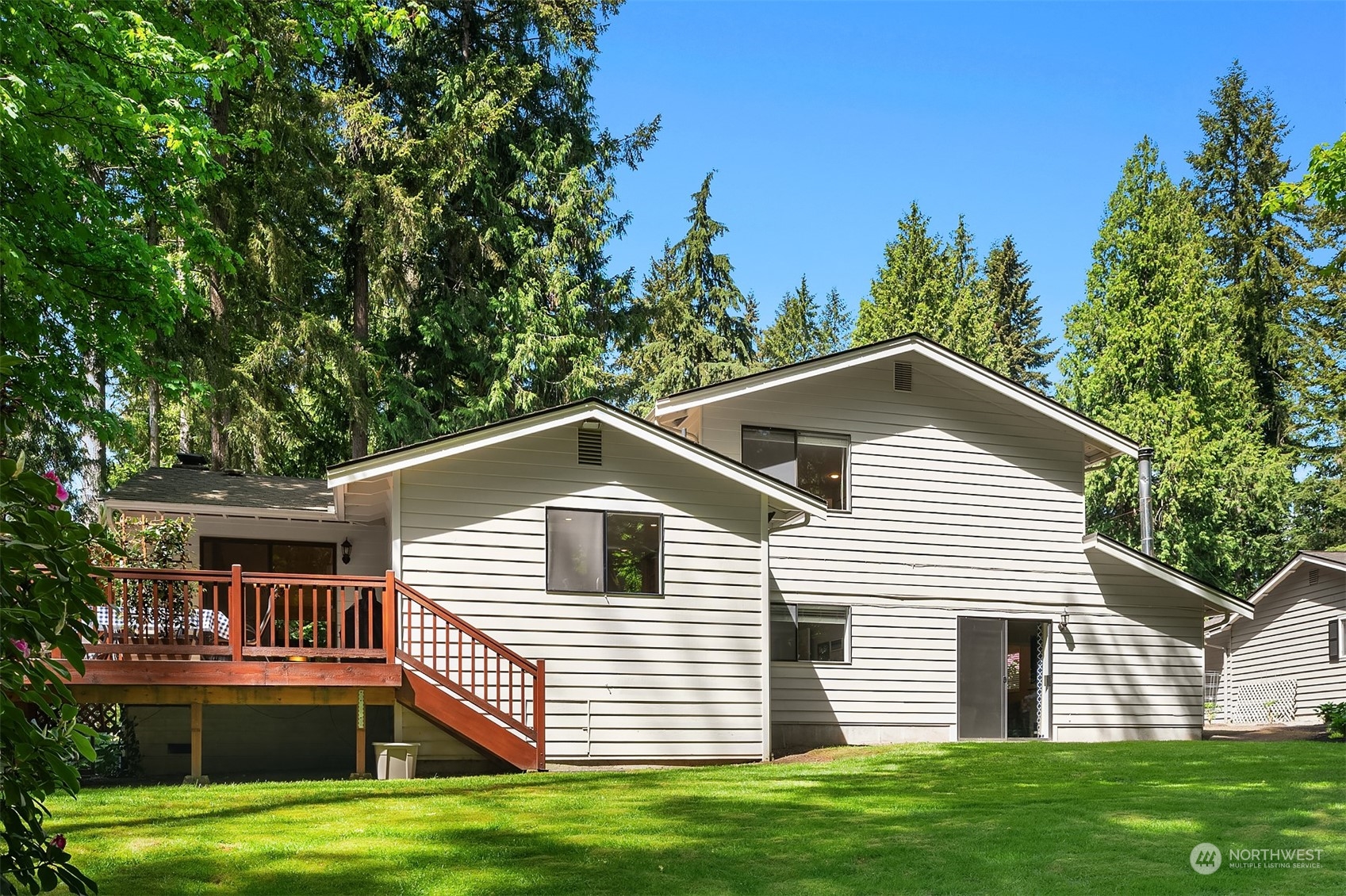 23017 38th Avenue Southeast Bothell, WA 98021 - Photo 34 of 38 a front view of a house with a yard