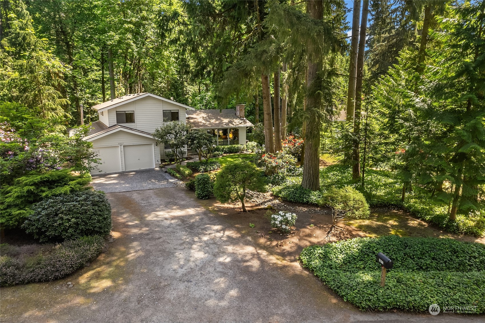 23017 38th Avenue Southeast Bothell, WA 98021 - Photo 36 of 38 a backyard of a house with lots of green space