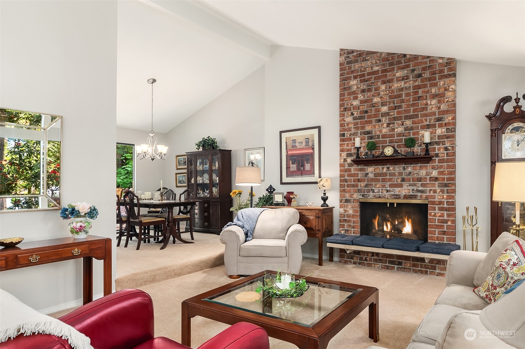 23017 38th Avenue Southeast Bothell, WA 98021 - Photo 5 of 38 a living room with furniture fireplace and window
