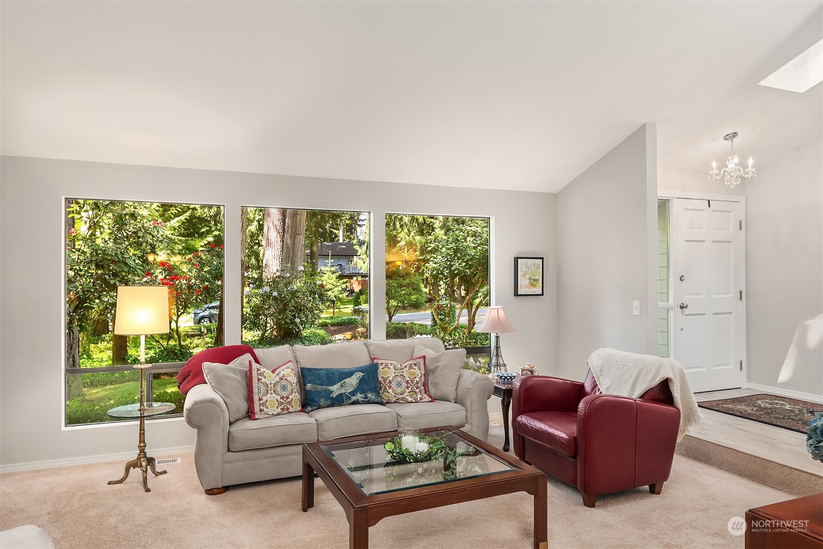 23017 38th Avenue Southeast Bothell, WA 98021 - Photo 6 of 38 a living room with furniture and a large window