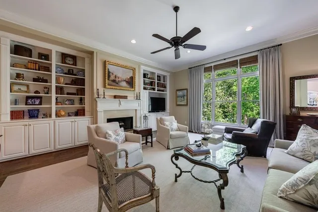 a spacious bedroom with a bed and a couch