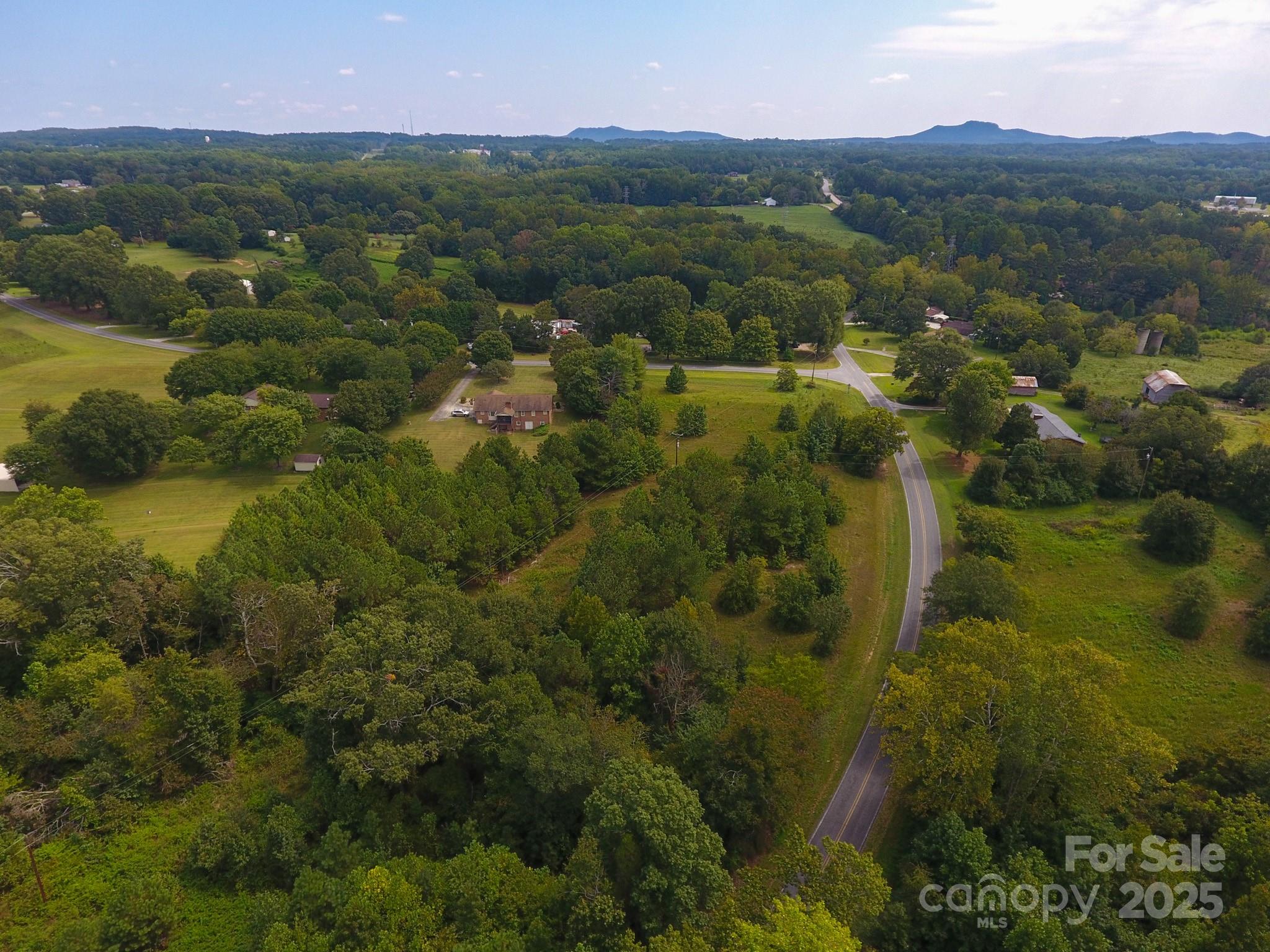 0 Putnam Lake Road Kings Mountain, NC 28086 - Photo 12 of 13 an aerial view of residential houses with outdoor space and trees