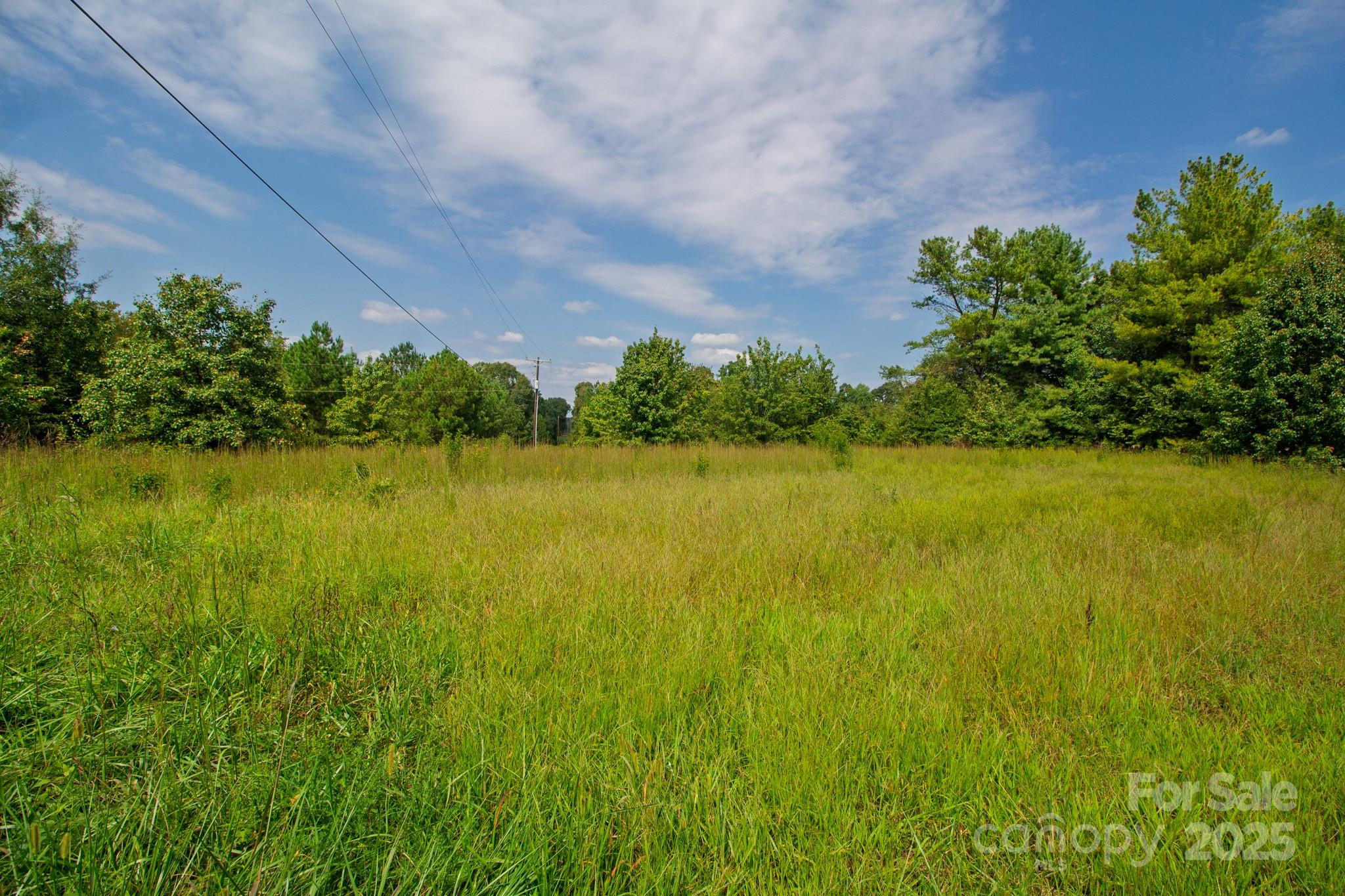 0 Putnam Lake Road Kings Mountain, NC 28086 - Photo 6 of 13 a view of a lake with a big yard