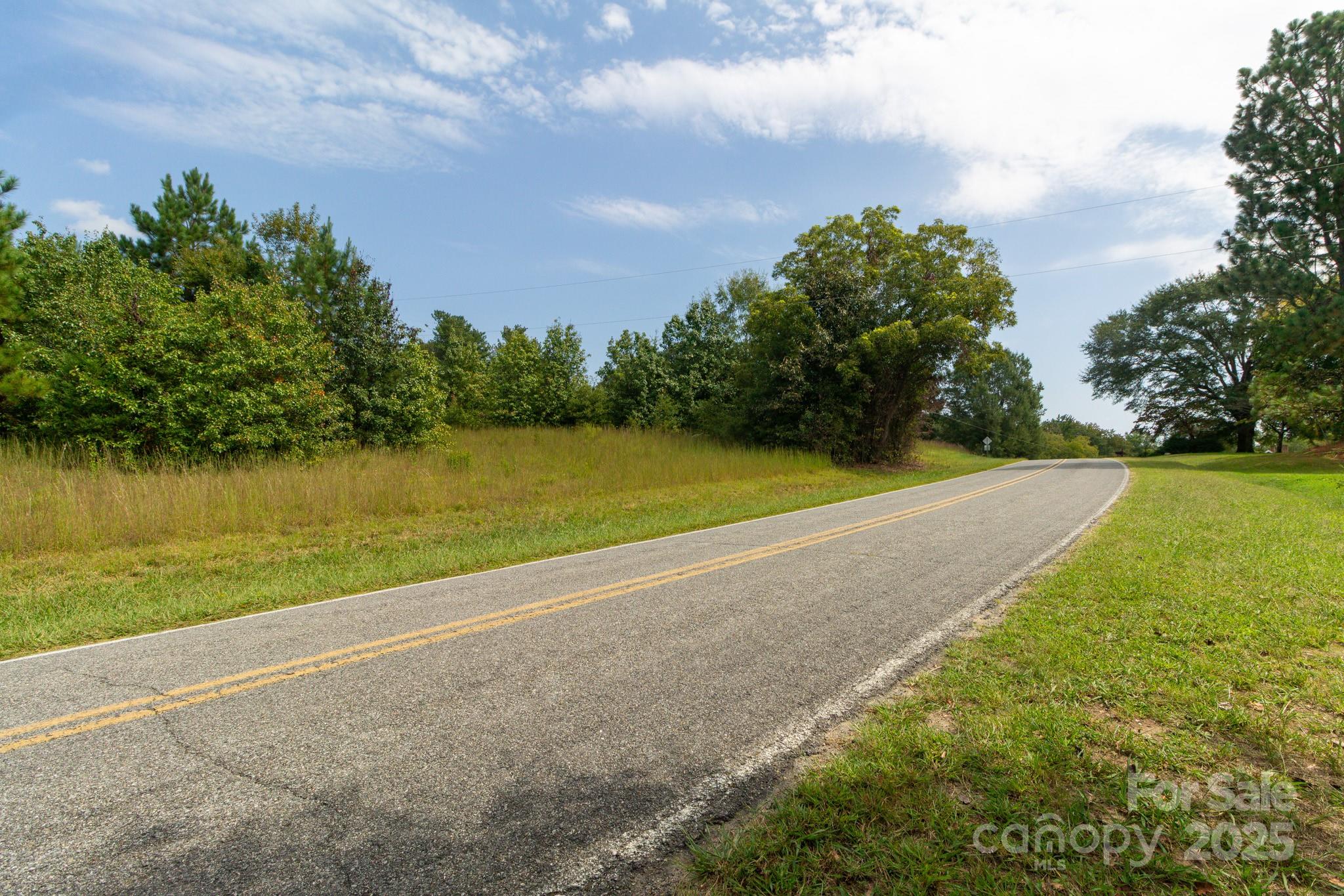0 Putnam Lake Road Kings Mountain, NC 28086 - Photo 9 of 13 a view of a lake with a yard
