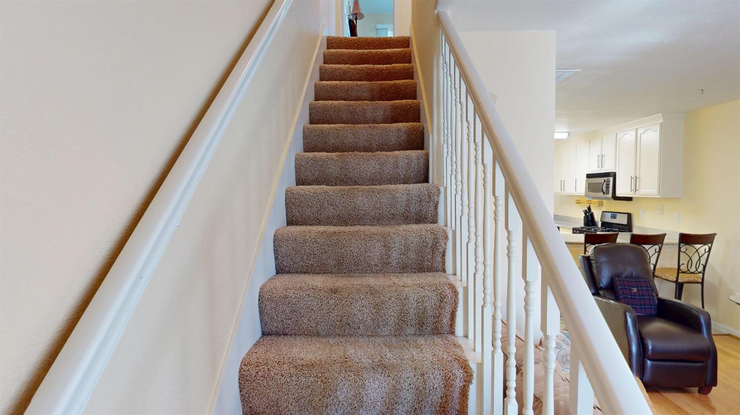 4057 Dale Road, Unit B Modesto, CA 95356 - Photo 12 of 39 a living room with furniture and stairs