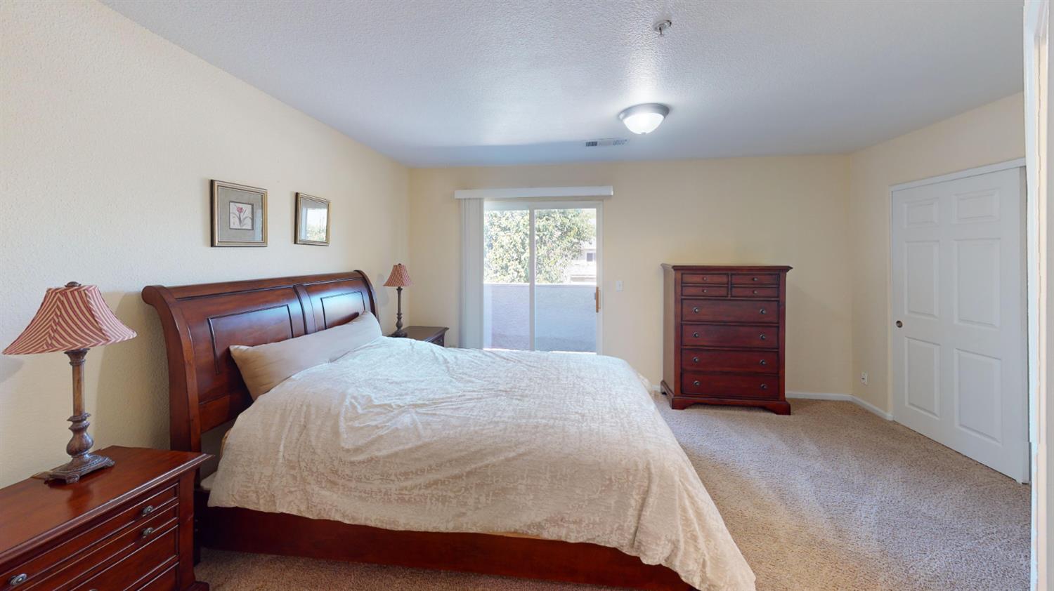 4057 Dale Road, Unit B Modesto, CA 95356 - Photo 13 of 39 a bedroom with a bed and a dresser