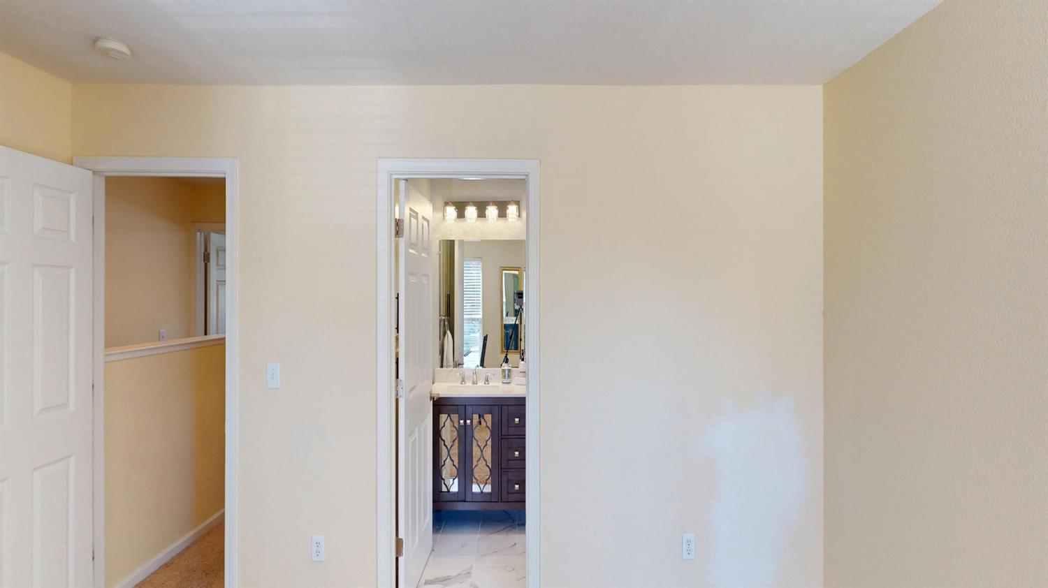 4057 Dale Road, Unit B Modesto, CA 95356 - Photo 18 of 39 a view of a hallway with wooden floor