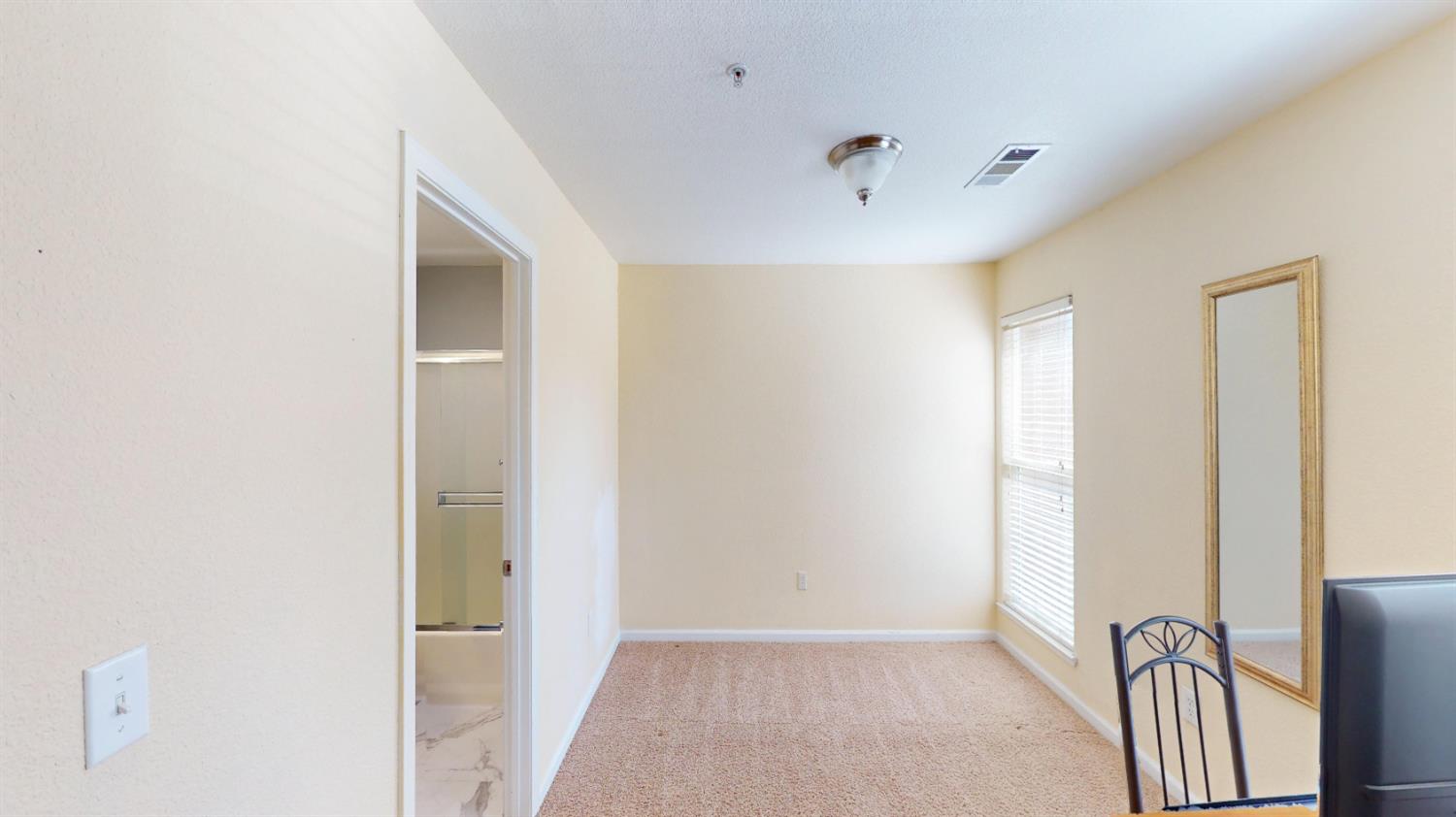 4057 Dale Road, Unit B Modesto, CA 95356 - Photo 19 of 39 a view of a hallway to a bedroom