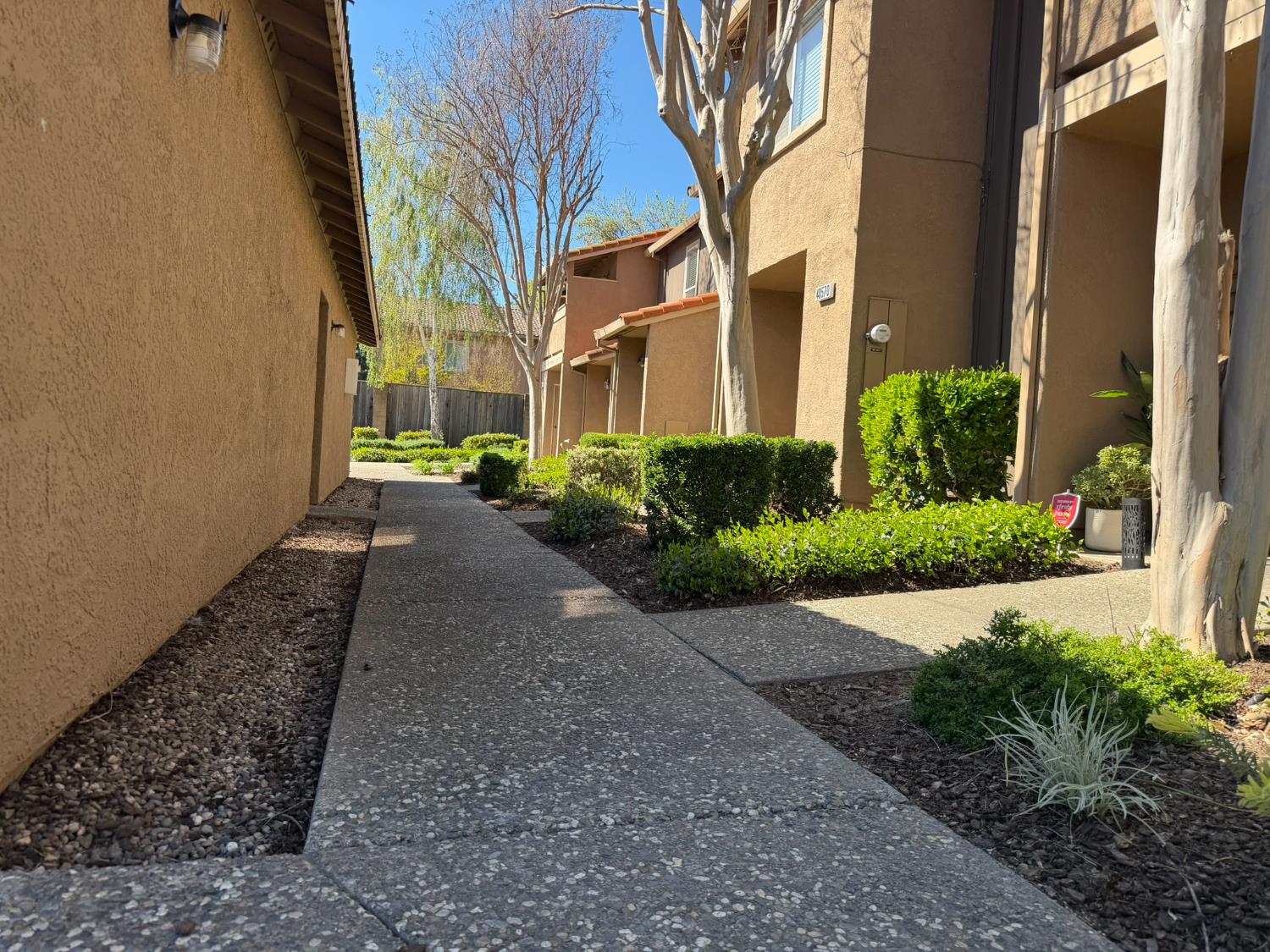 4057 Dale Road, Unit B Modesto, CA 95356 - Photo 31 of 39 a view of a pathway with a garden
