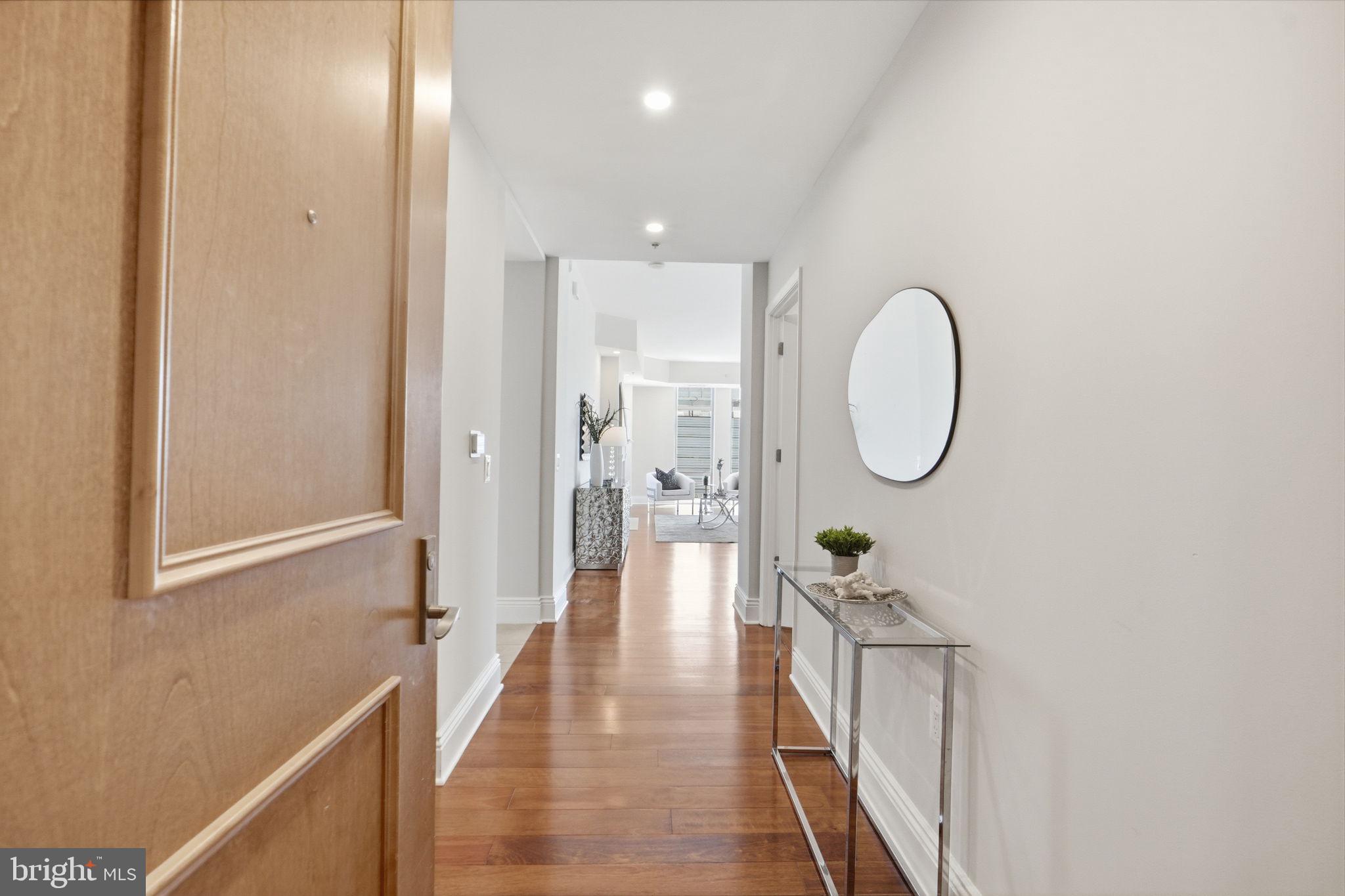 11990 Market Street, Unit 2103 Reston, VA 20190 - Photo 2 of 78 Inviting entryway with modern charm.