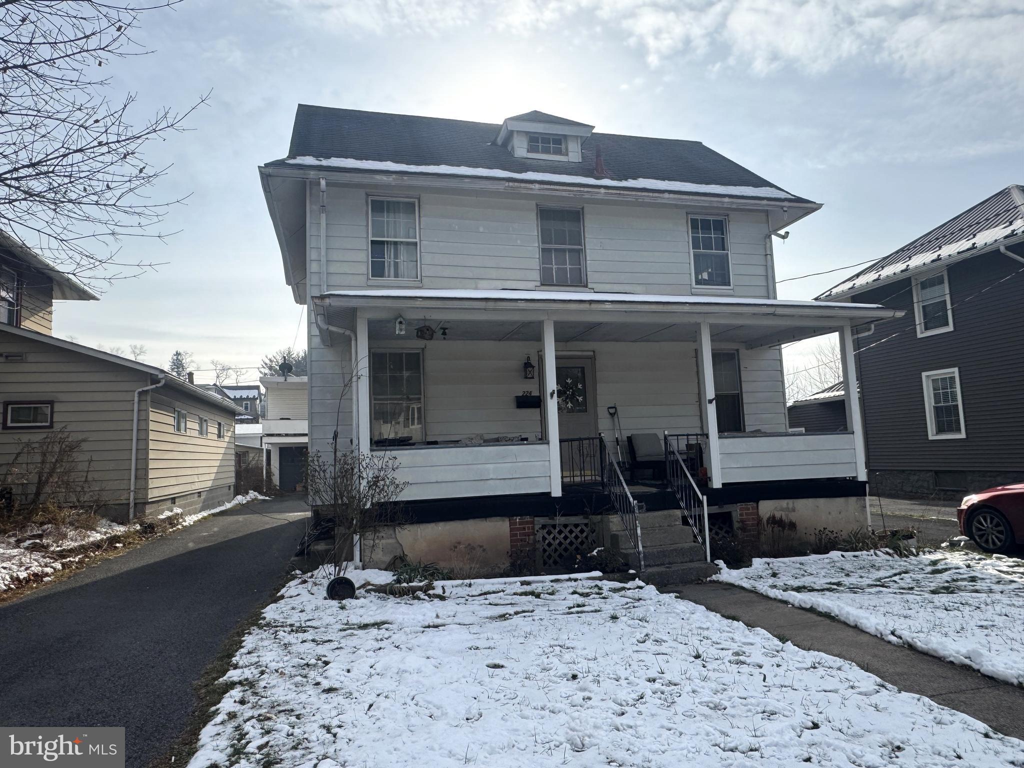224 7th Avenue Burnham, PA 17009 - Photo 2 of 27 a front view of a house with a yard