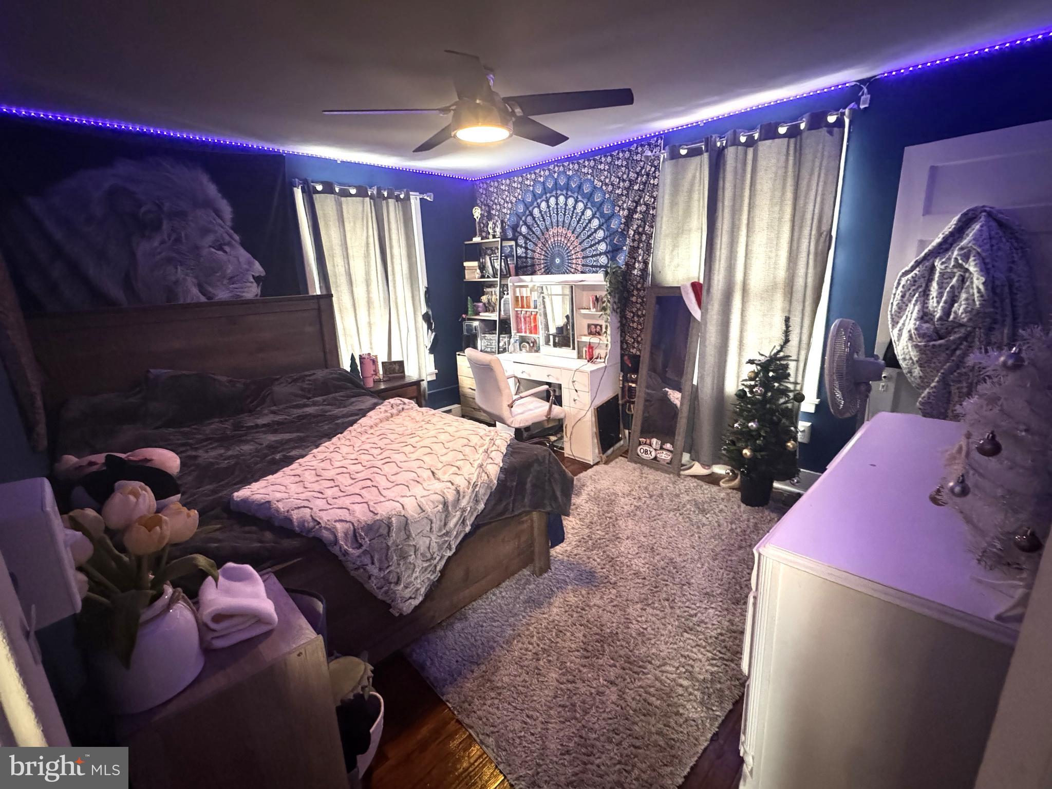 224 7th Avenue Burnham, PA 17009 - Photo 21 of 27 a bedroom with a bed and a mirror