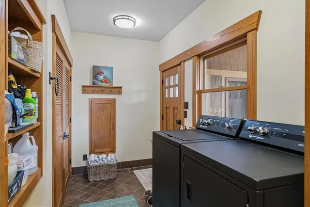 a room with furniture and a window