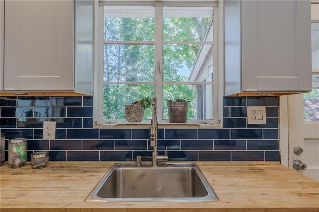1920 West Forrest Avenue Atlanta, GA 30344 - Photo 12 of 28 a view of kitchen sink and wooden floor
