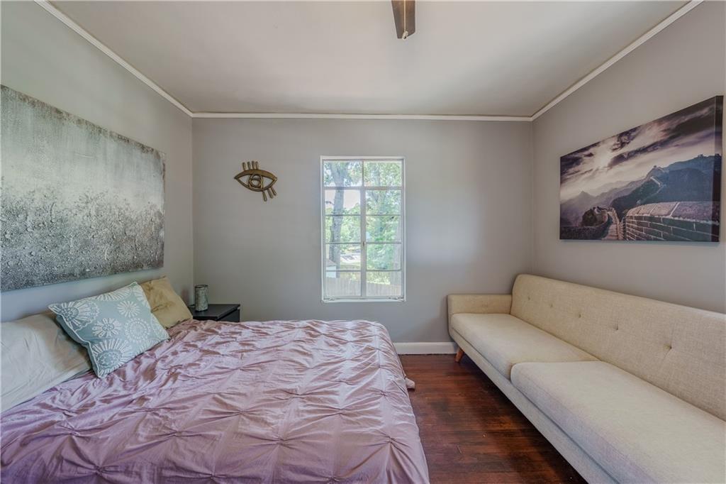 1920 West Forrest Avenue Atlanta, GA 30344 - Photo 19 of 28 a bedroom with a bed and a couch