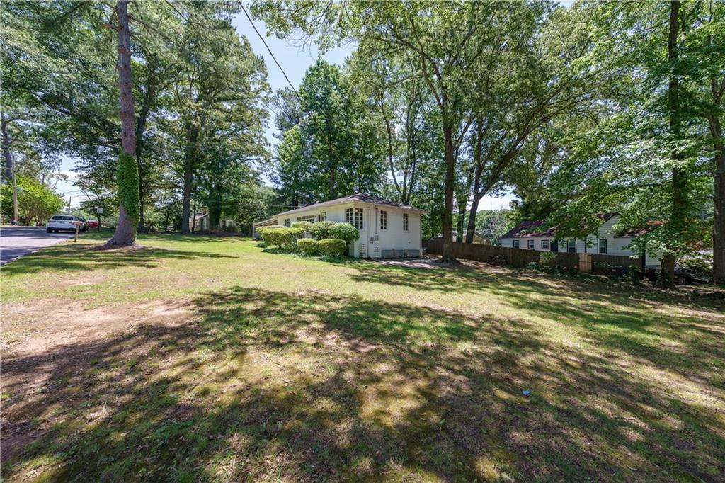 1920 West Forrest Avenue Atlanta, GA 30344 - Photo 26 of 28 a view of a house with a yard