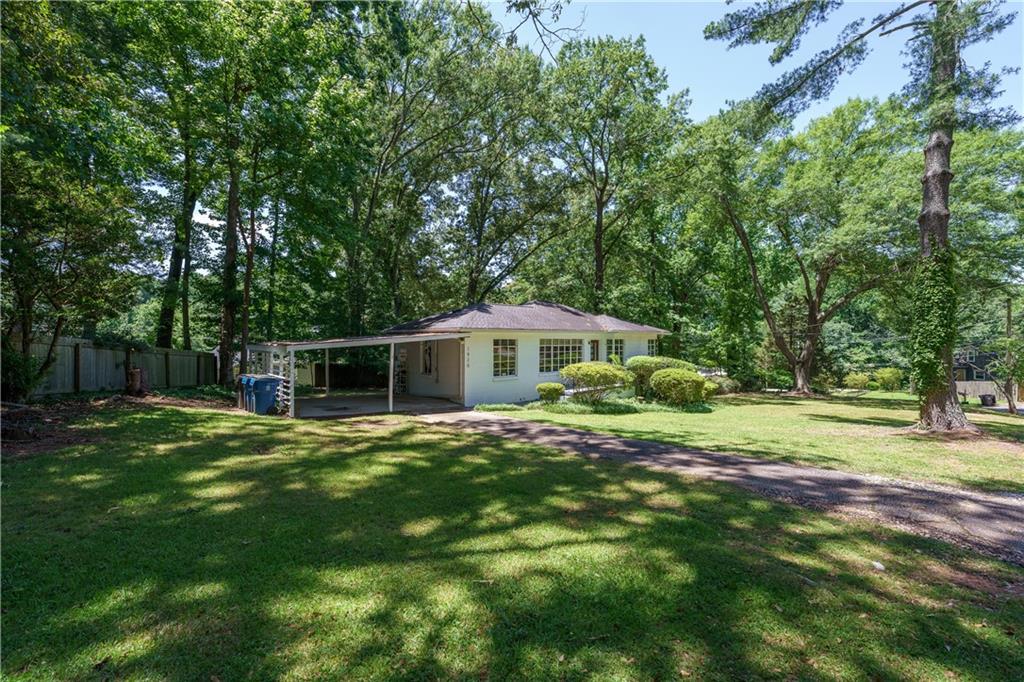 1920 West Forrest Avenue Atlanta, GA 30344 - Photo 27 of 28 a view of a house with a yard