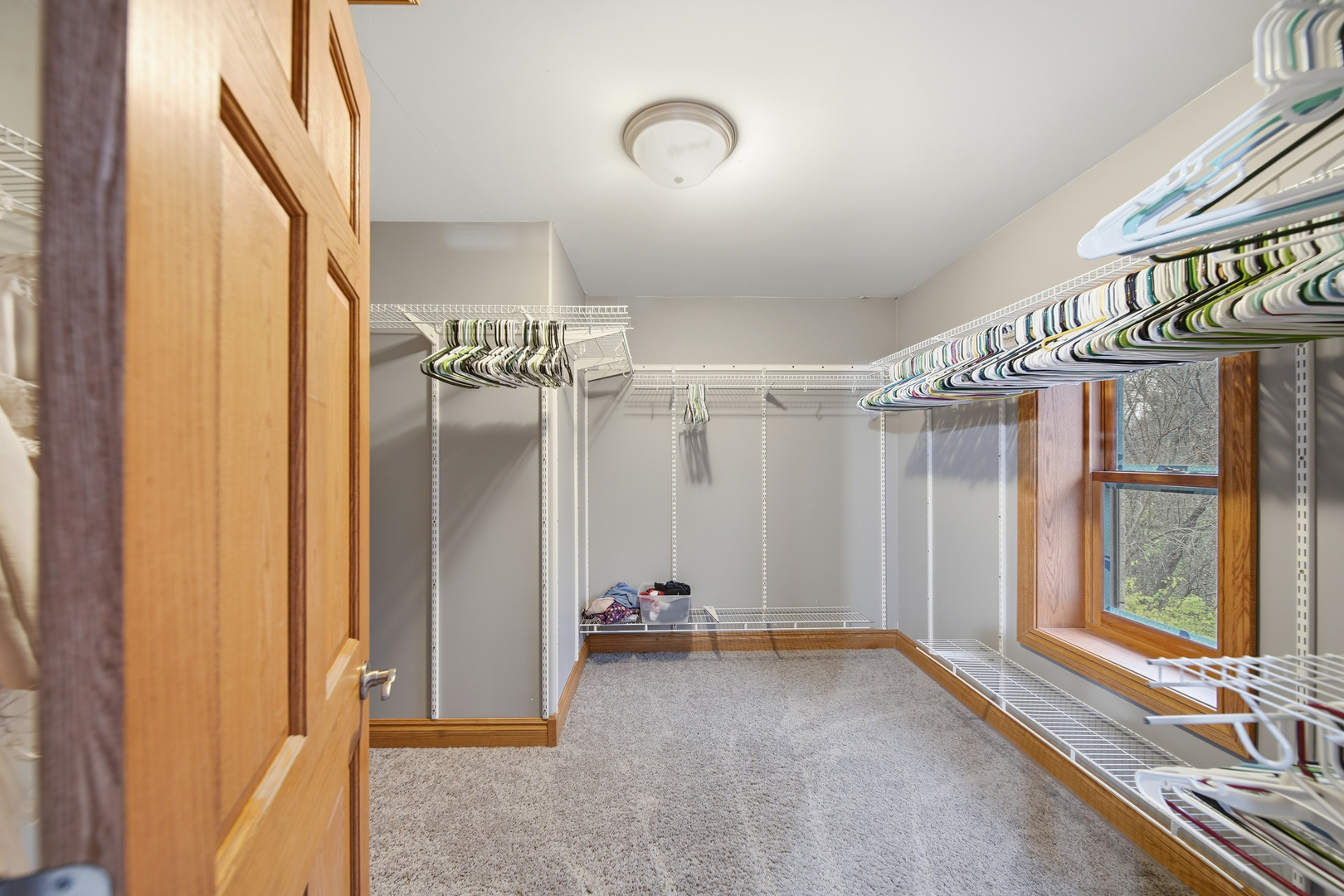 7231 South Lost Nation Road Dixon, IL 61021 - Photo 33 of 39 a view of a hallway with windows