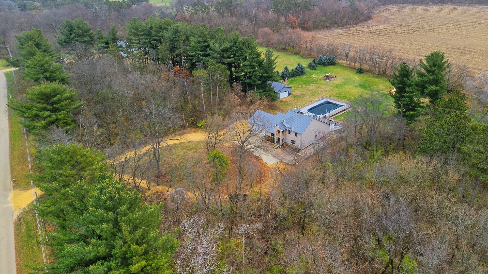 7231 South Lost Nation Road Dixon, IL 61021 - Photo 4 of 39 an aerial view of a house with a yard