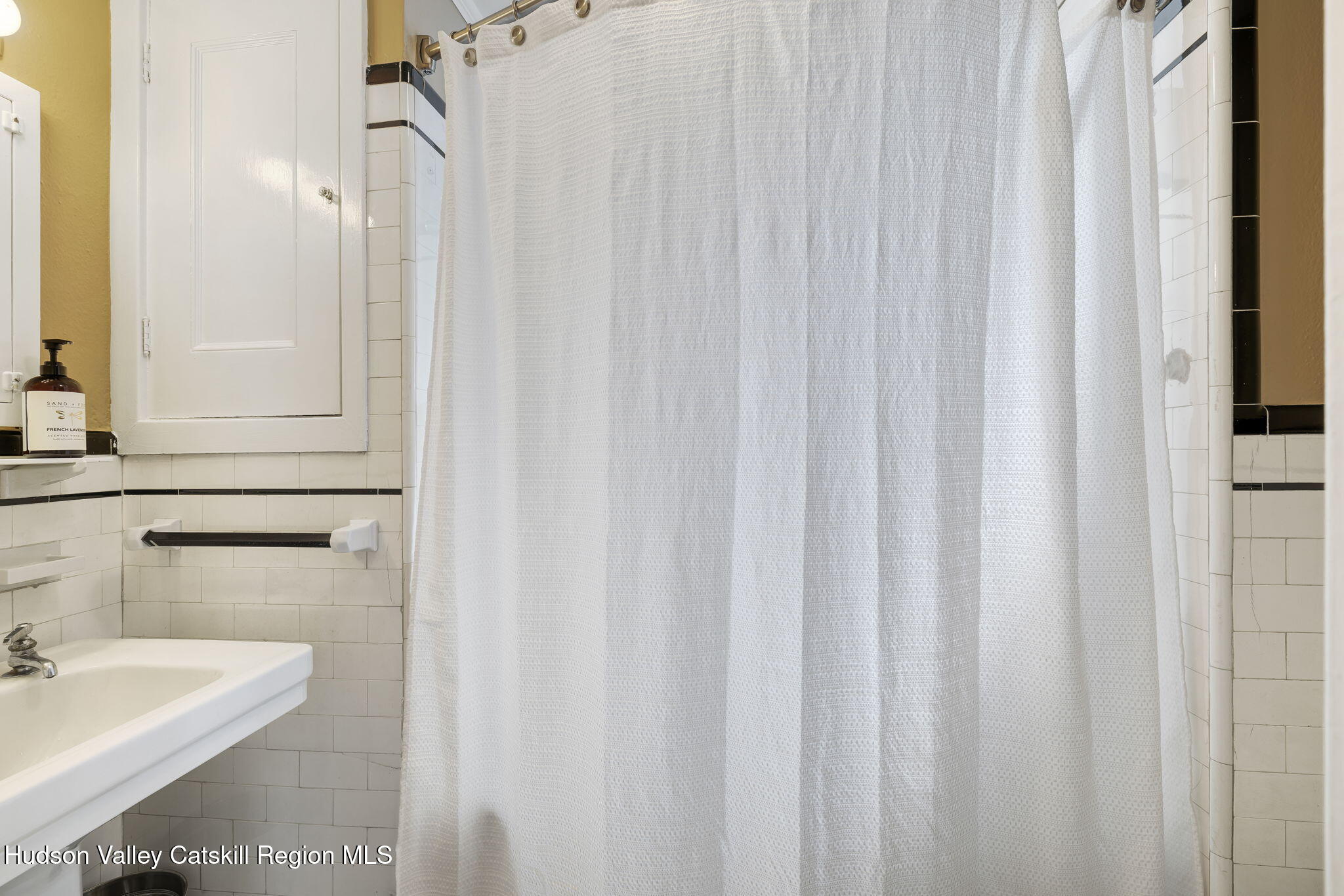 11 Seaman Road Poughkeepsie, NY 12601 - Photo 27 of 49 a bathroom with a sink and a mirror