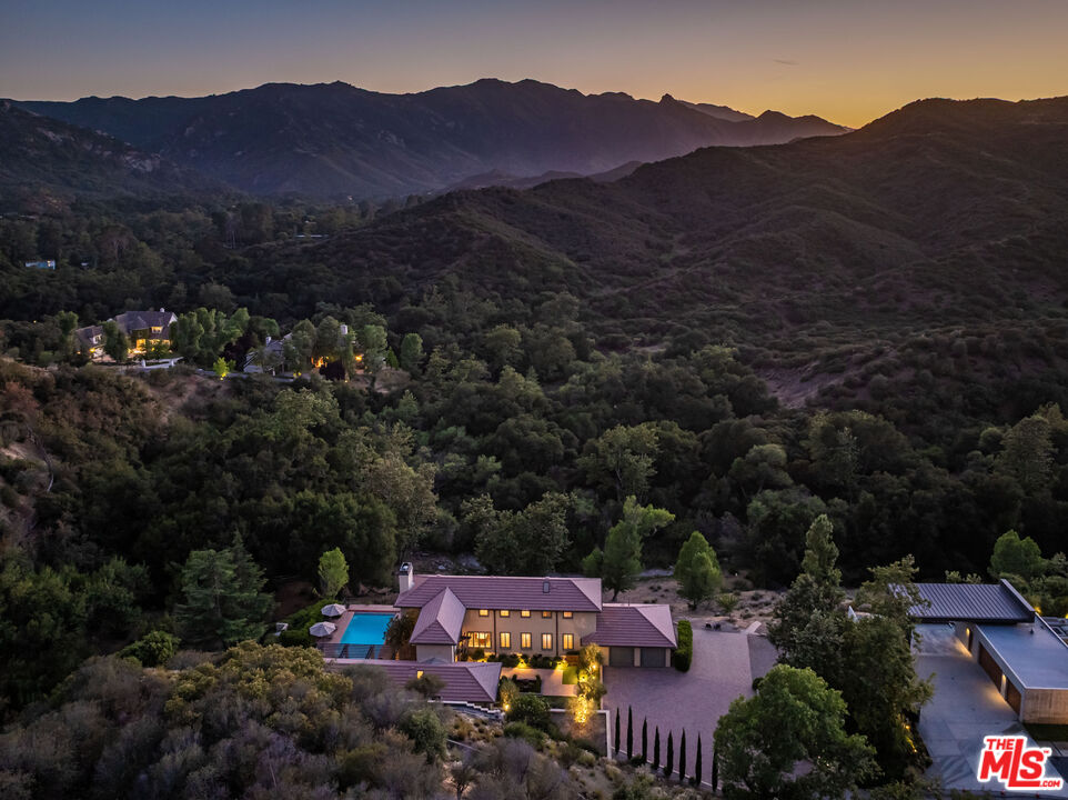 1045 Cold Canyon Road Calabasas, CA 91302 - Photo 50 of 51 an aerial view of a town with couple of houses
