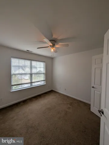 an empty room with a door