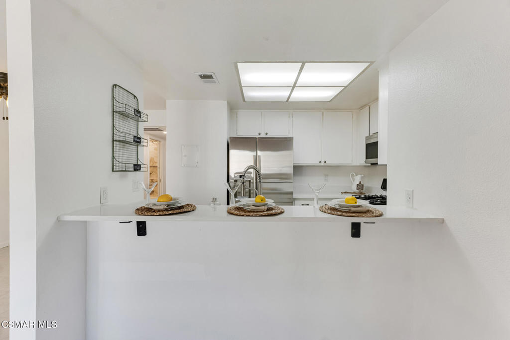 1912 Heywood Street, Unit D Simi Valley, CA 93065 - Photo 25 of 40 wooden view of kitchen with appliances and cabinets