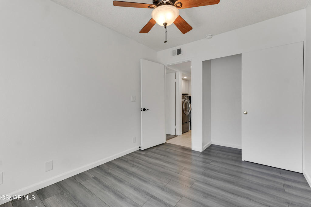 1912 Heywood Street, Unit D Simi Valley, CA 93065 - Photo 32 of 40 a view of an empty room and wooden floor
