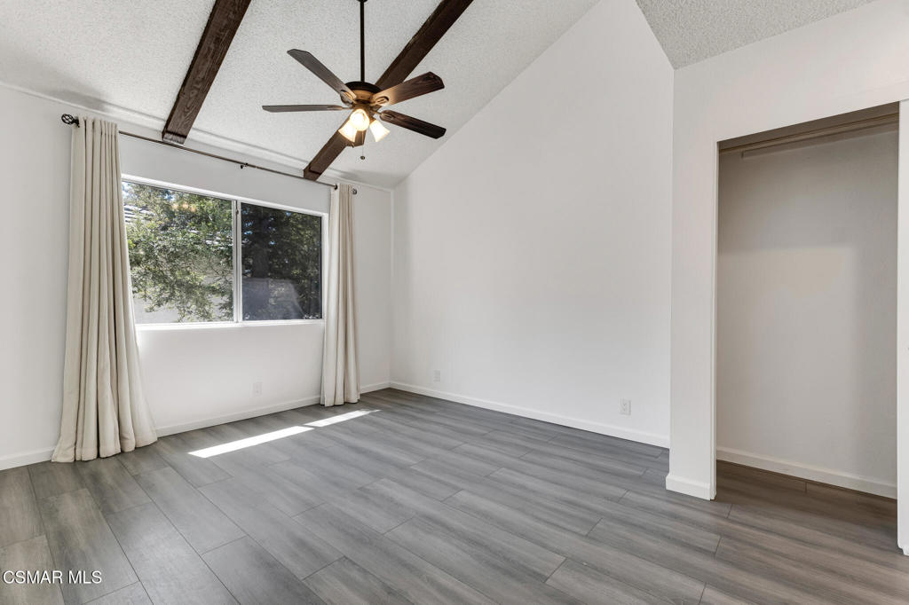 1912 Heywood Street, Unit D Simi Valley, CA 93065 - Photo 33 of 40 an empty room with wooden floor fan and windows