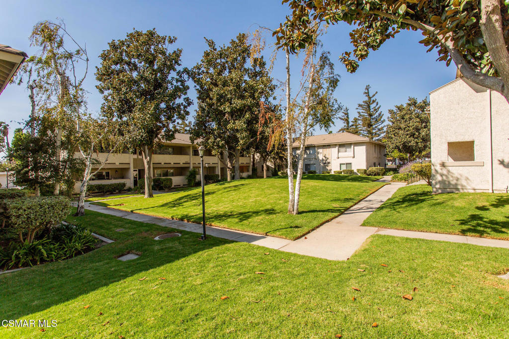 1912 Heywood Street, Unit D Simi Valley, CA 93065 - Photo 37 of 40 a view of a house with swimming pool and a yard