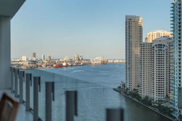 a view of balcony with furniture