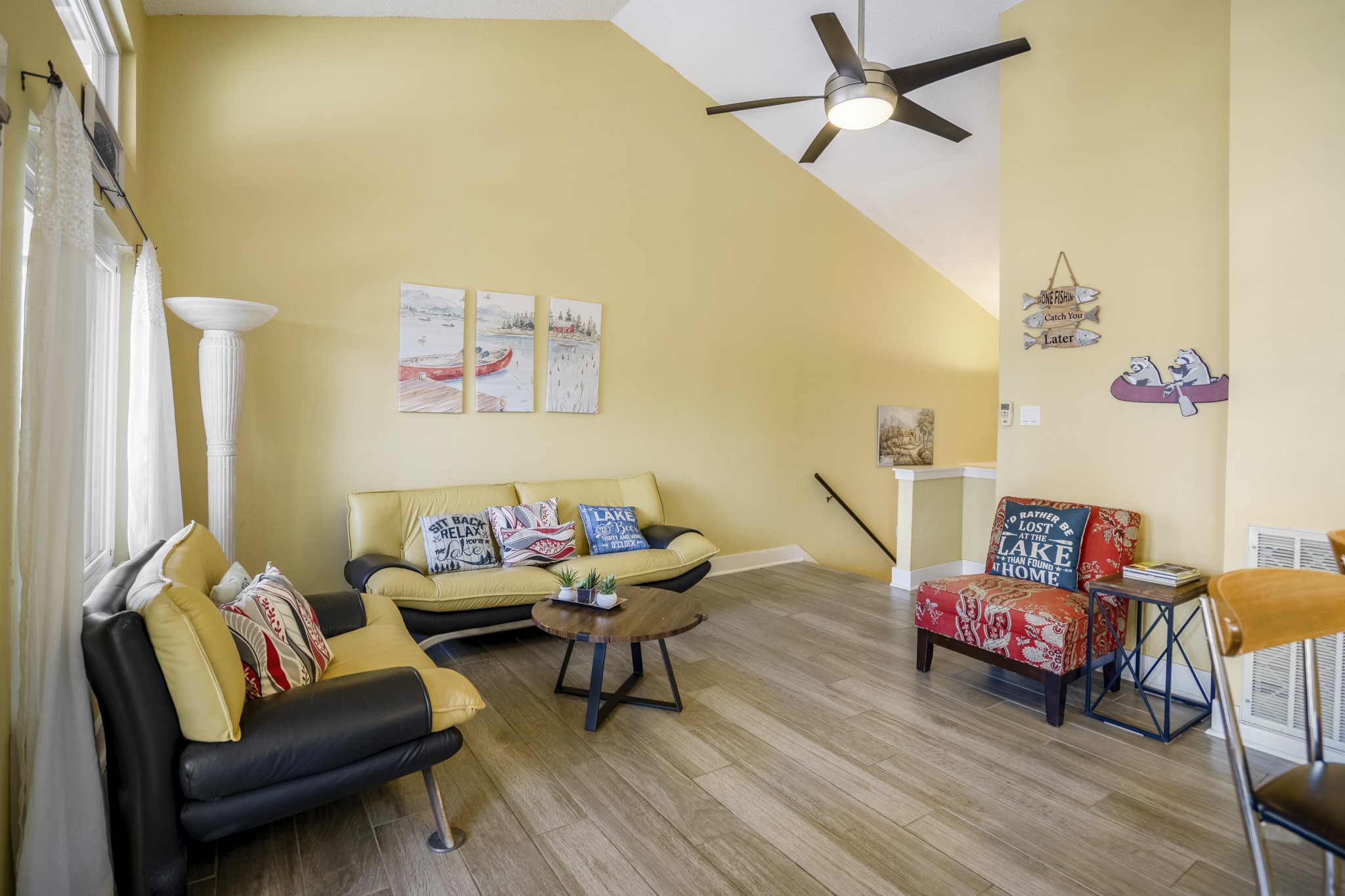 22547 Bayview Circle Point Blank, TX 77364 - Photo 19 of 46 a living room with furniture and a wooden floor