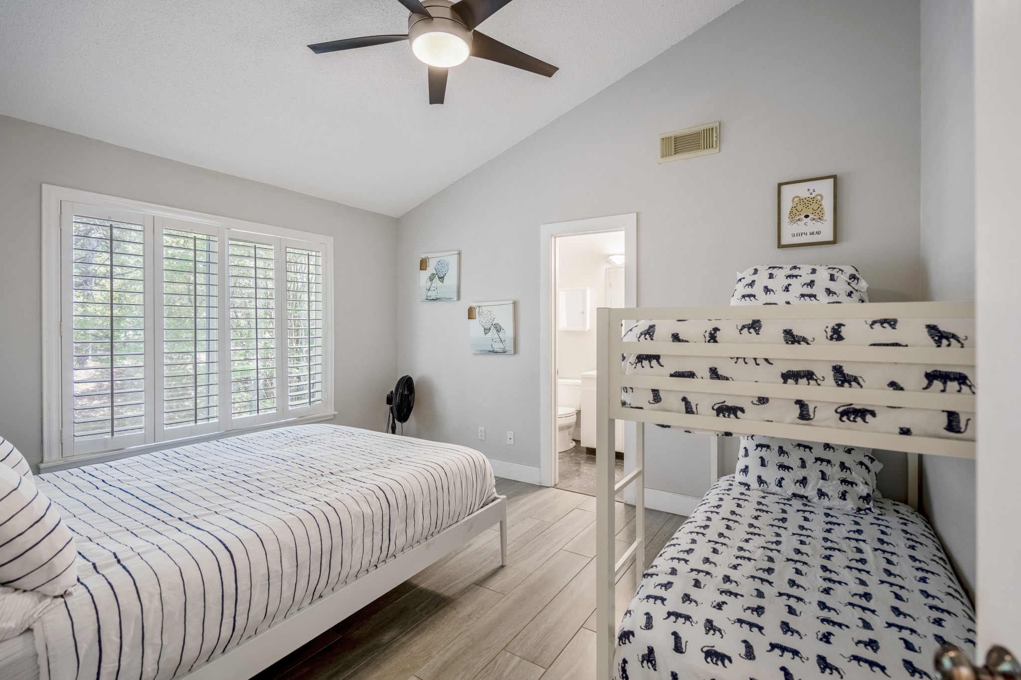 22547 Bayview Circle Point Blank, TX 77364 - Photo 20 of 46 a bedroom with a bed and a walk in closet