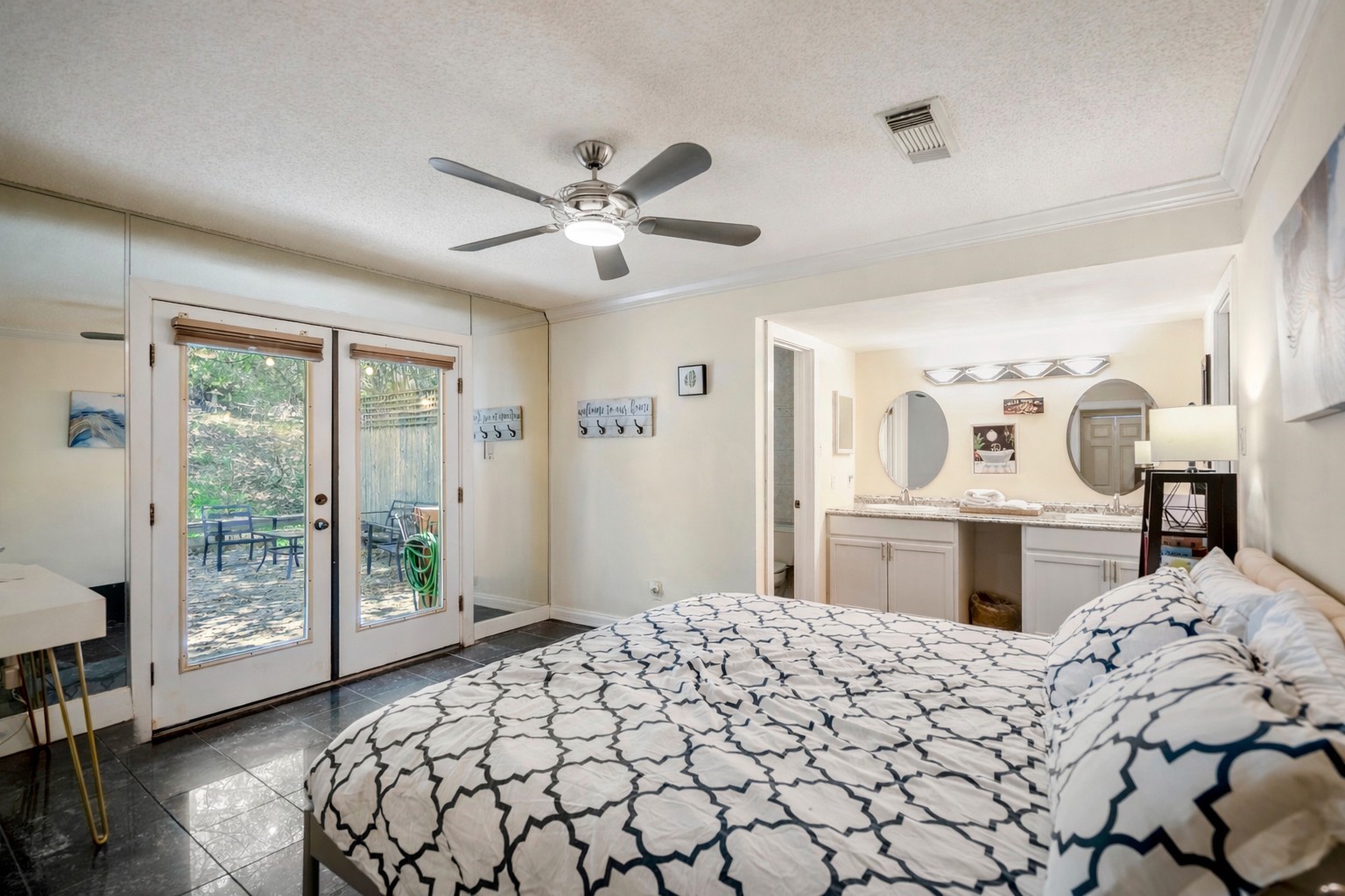 22547 Bayview Circle Point Blank, TX 77364 - Photo 24 of 46 a bedroom with a large bed and a tv