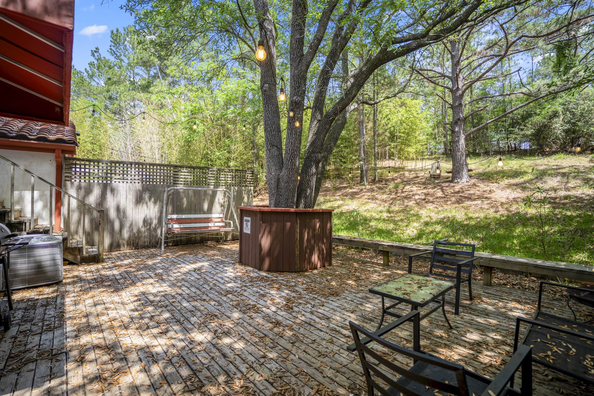 22547 Bayview Circle Point Blank, TX 77364 - Photo 30 of 46 a view of a backyard with sitting area