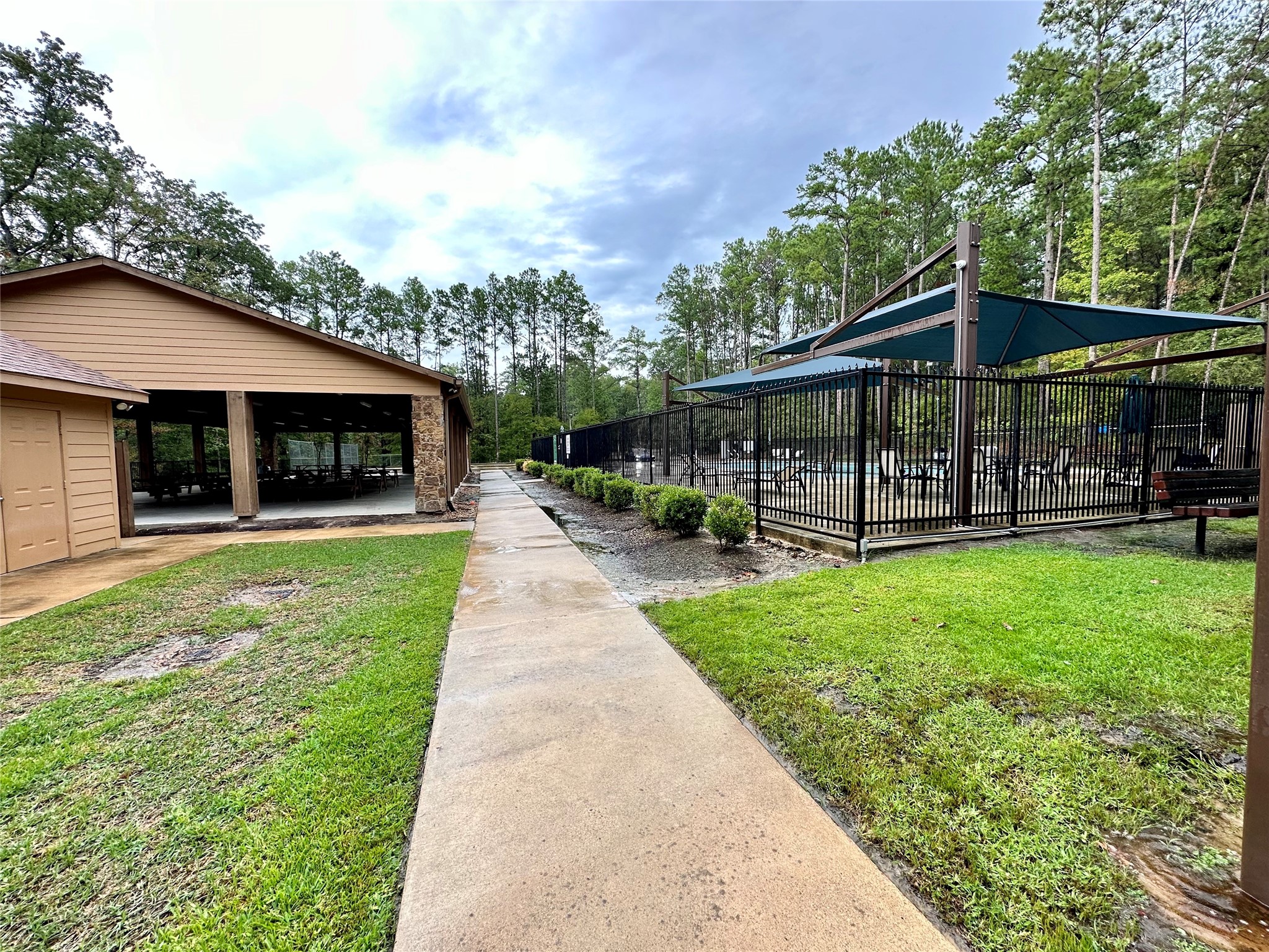 22547 Bayview Circle Point Blank, TX 77364 - Photo 41 of 46 a front view of a house with garden