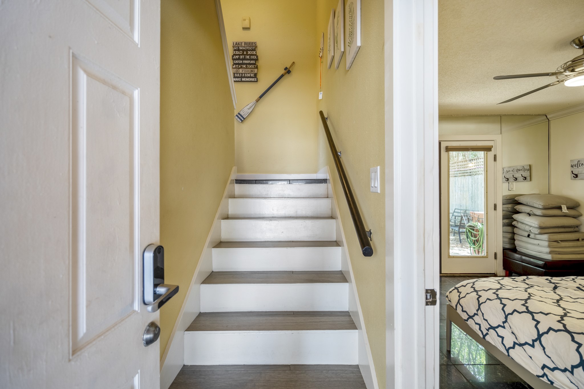 22547 Bayview Circle Point Blank, TX 77364 - Photo 5 of 46 a view of entryway and hall with wooden floor