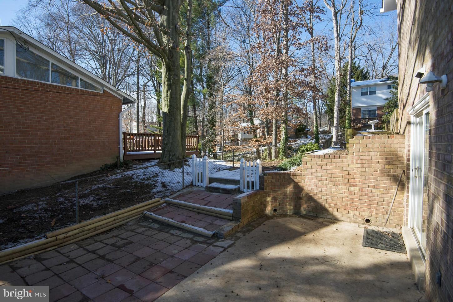 5508 Margate Street Springfield, VA 22151 - Photo 13 of 27 a backyard of a house with outdoor seating
