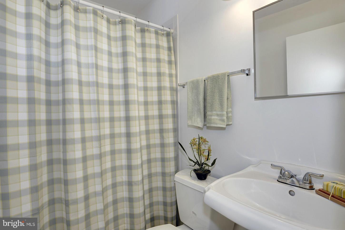 5508 Margate Street Springfield, VA 22151 - Photo 20 of 27 a bathroom with a sink and a toilet